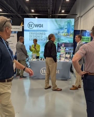 wgi booth talking to leaders
