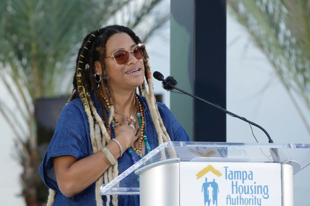 International Artist, Ya La'ford speaks at the unveiling of "Boulevard Flow"