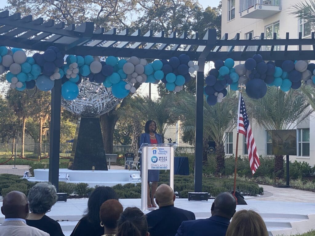 Alesia Scott-Ford, Field Office Director of the Tampa Housing Community speaks at the unveiling of "Boulevard Flow"